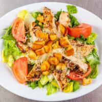 Caesar Salad · Romaine lettuce, tomatoes, romano cheese and fresh croutons. Plain or with chicken for an ex...