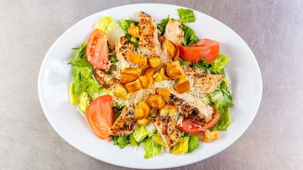 Caesar Salad · Romaine lettuce, tomatoes, romano cheese and fresh croutons. Plain or with chicken for an extra cost.