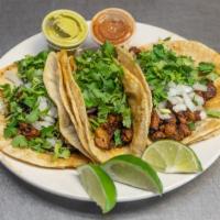 Tacos · Chicken, steak or ground beef. Served with lettuce, tomato, onions and cilantro. Pork - past...