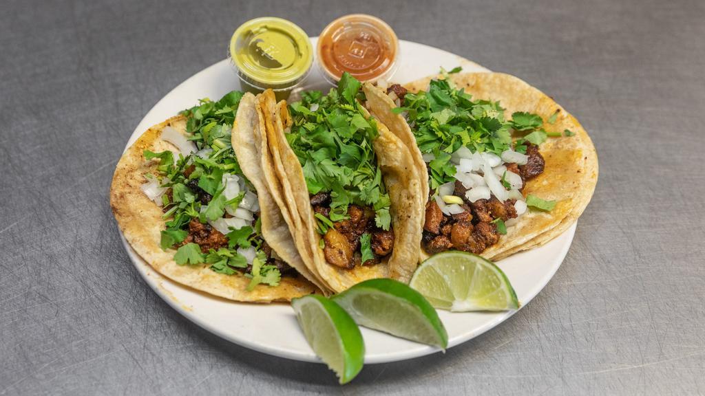 Tacos · Chicken, steak or ground beef. Served with lettuce, tomato, onions and cilantro. Pork - pastor for an extra cost.
