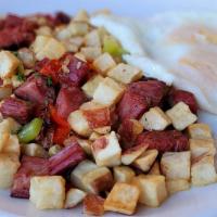 Corned Beef Hash N' Eggs · House-cured cubed corned beef with potatoes, green peppers and onions
Add gruyere for an add...