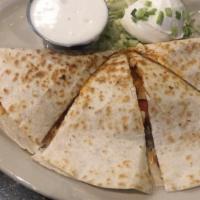 Buffalo Quesadilla · Grilled chicken breast tossed in your choice of mild or hot buffalo sauce, cheddar/jack chee...