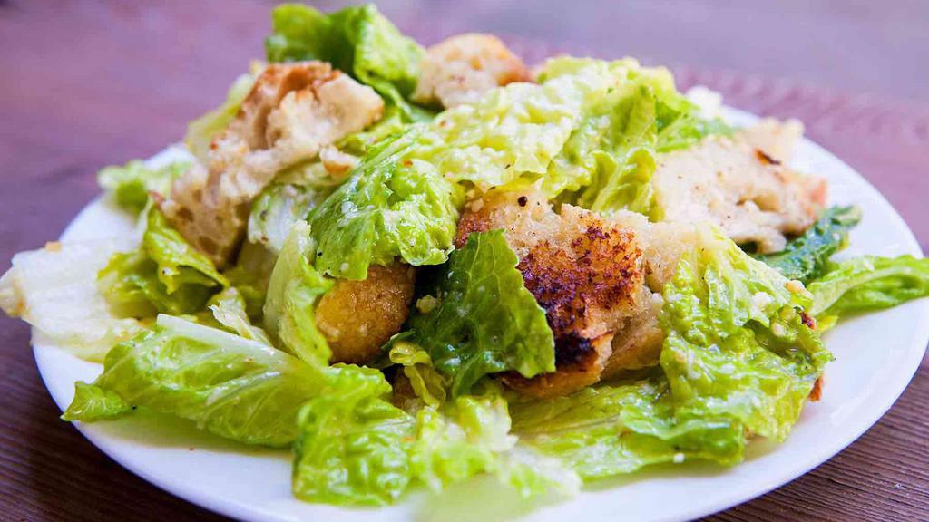 Full Caesar Salad · Hearts of romaine tossed in our caesar dressing and topped with croutons and parmesan cheese | Add bread chicken, grilled chicken or salmon for $