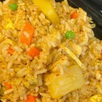 Curry - Fried Rice · Eggs, pineapple, white  onions, cashews, peas and carrots, and curry powder.