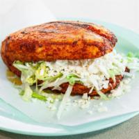 Pambazo · Chorizo with Potato 
services with lettuces, sour cream and cheese