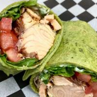 Salmon Blt Wrap · Roasted salmon, bacon, lettuce, tomato, mayo, in a spinach wrap.