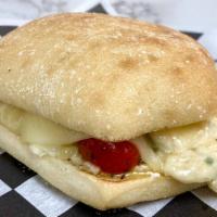 Cheese Guido · Roasted Tomatoes, provolone, garlic cheese melt, grilled on ciabatta