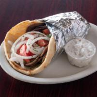 Gyros Sandwich · Thinly sliced gyro meat on pita bread with tomato and onion served with a side of cucumber s...