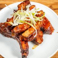 Bbq Ribs · Baby back ribs, Asian style BBQ sauce and spice blend.