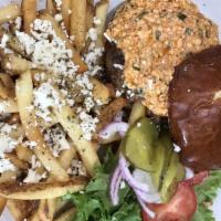 Greek Burger · House specialty. Half ounces Angus beef served on a pretzel bun with spicy feta cheese and G...