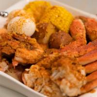 Combo 2 · Half pound snow crab leg, half pound shrimp and half pound sausage.

Each combo is served in...