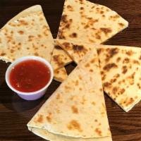 Quesadilla · Toasted and melted on the griddle. Perfect! Add some protein (Optional) for an additional ch...