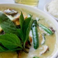Green Curry Tofu · Tofu, green beans, tomato, mango, mushroom, carrots, jalapeno, chinese eggplant in a coconut...