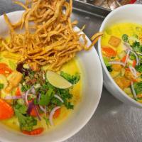 Kaosoi*(Northern Egg Noodle) · Mild* Egg noodle, sprouts, red onion, cilantro, scallion, and fried shallot topped with cris...