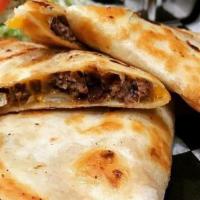 Cheesadilla · Quesadilla meets cheeseburger, certified Angus beef, blended cheese, green chili, lettuce, t...