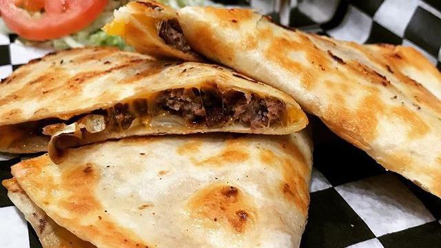 Cheesadilla · Quesadilla meets cheeseburger, certified angus beef, blended cheese, green chili, caramelized onion.