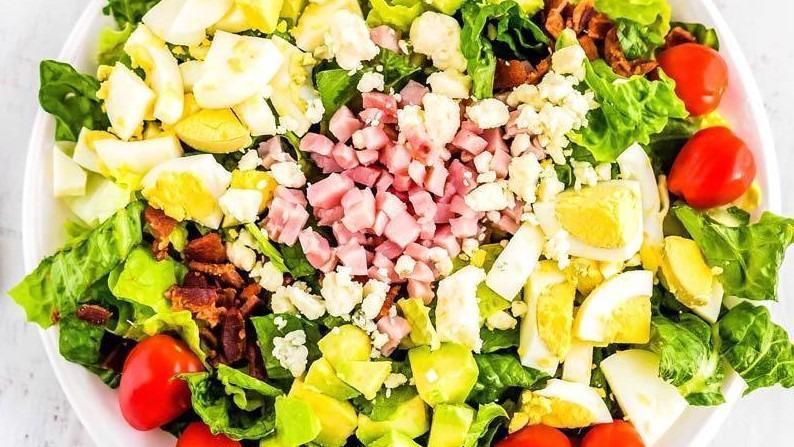 Bt Cobb Salad · Grilled Chicken or bacon. Tomato, cucumber, red onion, chopped egg, crumbled Blue cheese.