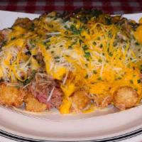 Bbq Tachos · BBQ TACHOS Perfectly fried tater tot with your choice of our signature pulled pork or choppe...