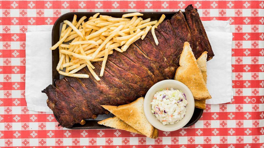 Bar-B-Que Pork Ribs · Most popular. Our signature item. These ribs don't fall off the bone and it's on purpose! Hardwood barbecued in our brick pit- the flavor is in it, not on it. Tastes just like bacon on a bone. Full slab approx 12 ribs. 1/2 slab approx 6 ribs.