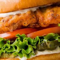 Crispy Fried Chicken Sandwich · All White Meat Deep Crispy Fried Chicken Served on a Toasted Bun with Pickles