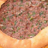 Medium Kafta Pie · Kafta pie has the right mix of ground Beef, tomatos, onions, parsley, garlic, spices & pinch...
