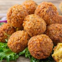 Falafel Pc/Dz (Vegan) · Deliciously deep-fried patties made from pureed chickpeas