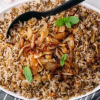 Modrdara(Lentil & Rice)(Per Lb) (Vegan) · Deliciously cooked lentils and white rice, garnished with sautéed onions. Pairs perfectly wi...