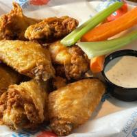 Chicken Wings - 12 Wings · Bone-in wings served with celery, carrots, and choice of ranch or blue cheese.