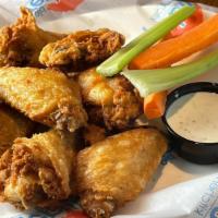 Chicken Wings - 8 Wings · Bone-in wings served with celery, carrots, and choice of ranch or blue cheese.