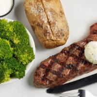 Ny Strip · Ream's dry-aged, 12 oz. certified Angus beef strip, hand-cut, seasoned, and broiled with gar...