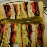 Club Sandwich · Triple decker with turkey, bacon, lettuce, tomatoes and mayo.