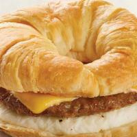 Sausage, Egg & Cheese · A buttery croissant with sausage, fried egg and cheese.