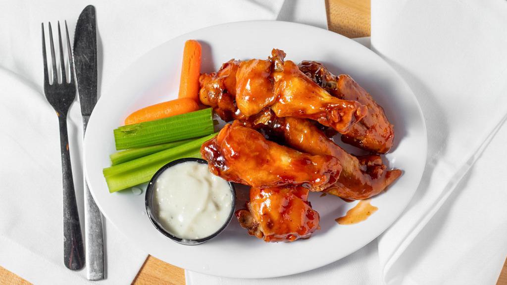 Joe’S Jumbo Wings · Jumbo chicken wings tossed in your favorite sauce! Served with celery and carrots, choice of ranch or bleu cheese dressing. One dozen.