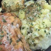 Fried Turkey Chop Dinner  · Includes 2 turkey chops smoked potatoes  and corn