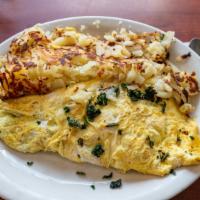 Spinach Omelette · With feta or swiss cheese. Prepared with 3 country fresh xl eggs and served with hash browns...