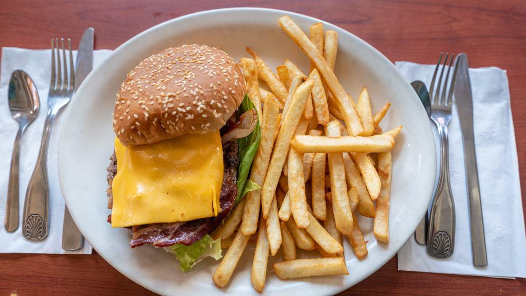 Cheeseburger · With american cheese. Hamburgers are 1/3 lb. All beef ground angus patties served with lettuce and tomatoes. Includes chips & a cup of soup.