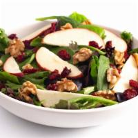 Cranberry Feta Salad · Mixed greens tossed with organic dried cranberries, grapes, pecan, raisins, feta cheese and ...