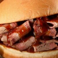 Beef Brisket · (Angus Beef) Sliced & Finished with Our Famous BBQ Sauce & a Pickle Spear