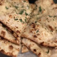 Garlic Naan · Made from a dough of fine flour with a taste of garlic.