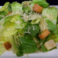 Caesar Salad · Chopped Romaine Lettuce, Shredded Parmesan, House Made Croutons.