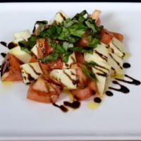 Caprese Salad · Roma Tomato, Fresh Mozzarella, Fresh Basil, Olive Oil, Balsamic Glaze.