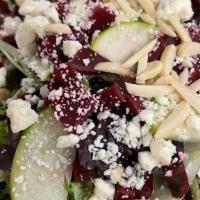 Apple And Beet · Mixed greens, roasted beets, granny smith apples, almonds, bleu cheese, balsamic vinaigrette.