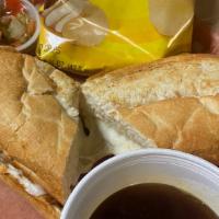 Italian Beef Sub  · Loaded with Beef, Giardiniera Peppers, and Mozzarella Cheese. Au Jus on the side.