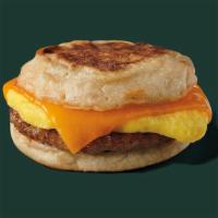 Sausage, Cheddar & Egg Sandwich · A savory sausage patty, fluffy eggs and aged Cheddar cheese served on a perfectly toasty Eng...