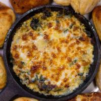 Spinach Dip · Our Take on the Classic. Served with Wedges of our Wood Fired Crust.