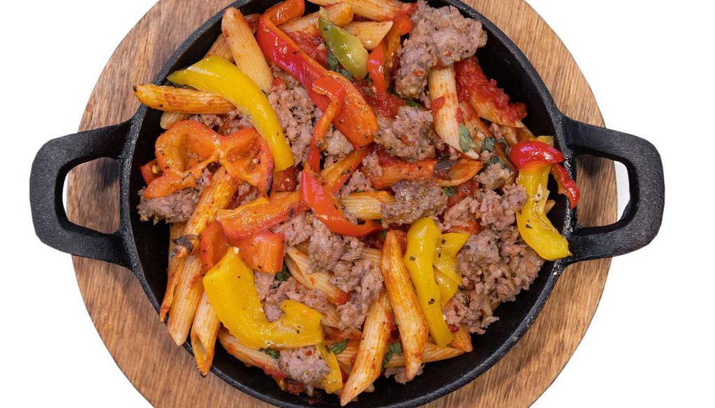 (I) Sausage & Peppers Pasta Individual · penne noodles tossed with crushed tomato marinara, spicy sausage, and grilled bell peppers.
