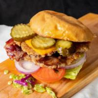 The Little Chief · 1/2 lb Chixen Burger with Romaine Tomato Onion Pickles Beef Bacon American Cheese & Chixen S...