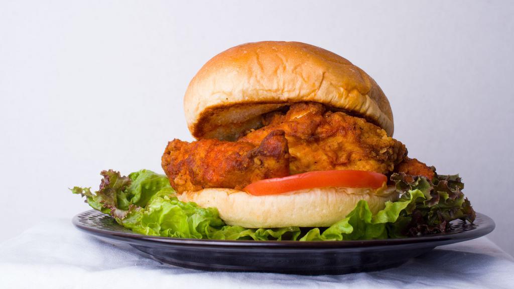Buffalo Chicken Finger Sandwich · Lettuce, tomatoes, and buffalo sauce. Served with A side of ranch.