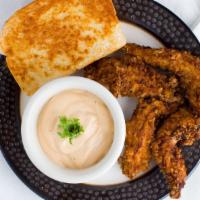 4 Chicken Fingers · Sauce and toast.