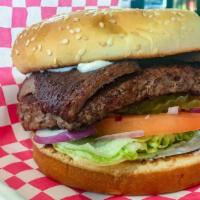 Joe'S Gyro Burger · Fresh cut lamb and 1/2 lb patty, cucumber sauce, lettuce, tomato, onion on pita bread.